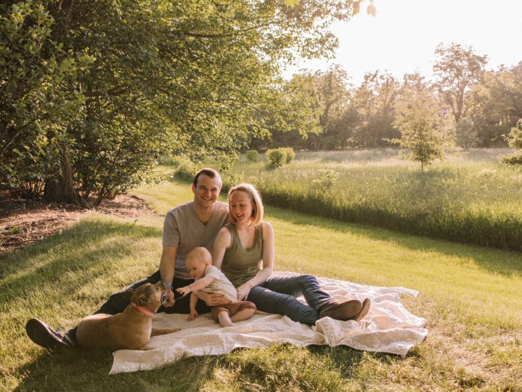 Family of three at golden hour at Greene Valley Forest Preserve